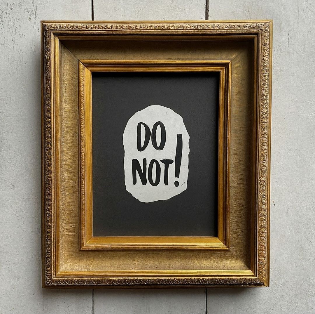 "Do Not" written in a frame